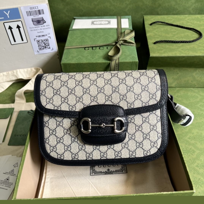 G*u*i satchel bags